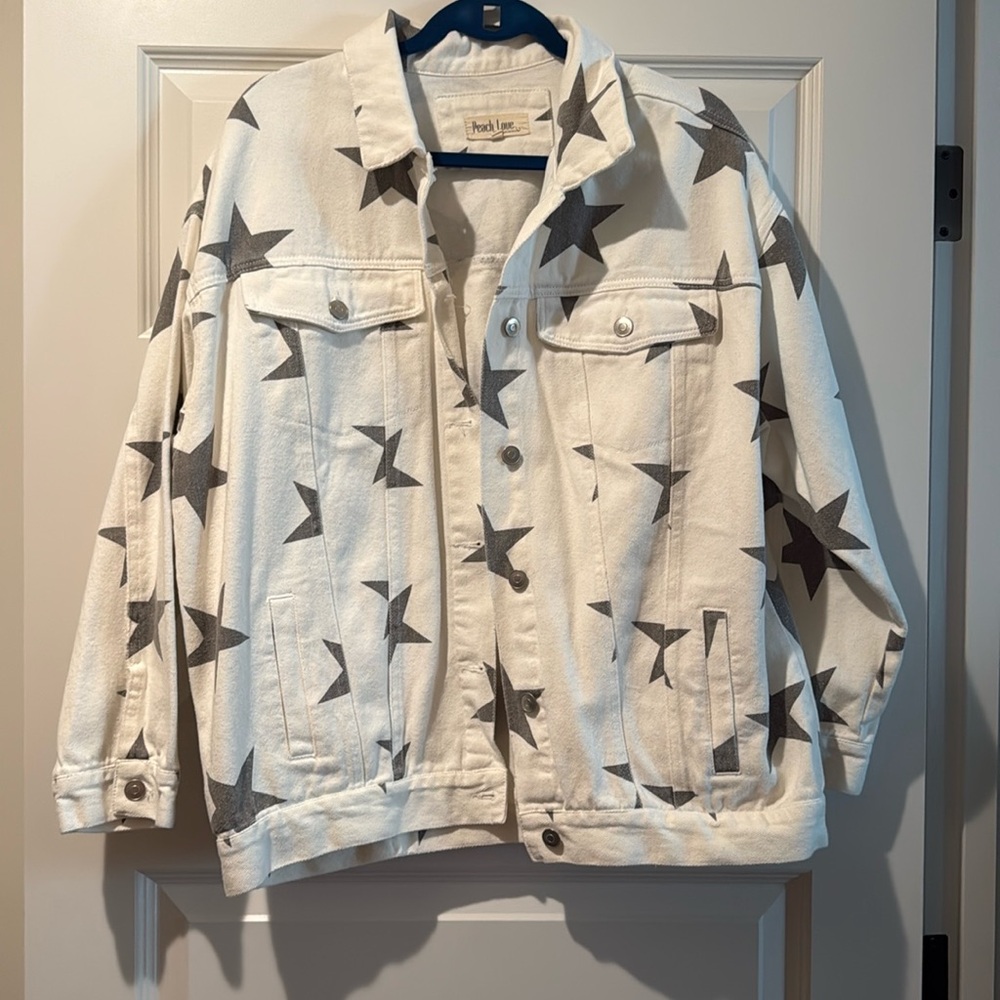 Oversized white denim jacket with grey stars